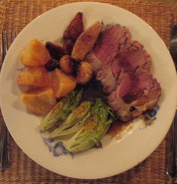 Rack of mutton de-boned after cooking and sliced - with braised lettle gem lettuce and roast potatoes