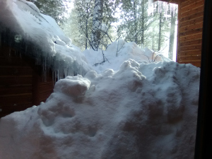 Out my front window.  Huge chunks from ice dams, too heavy to lift.