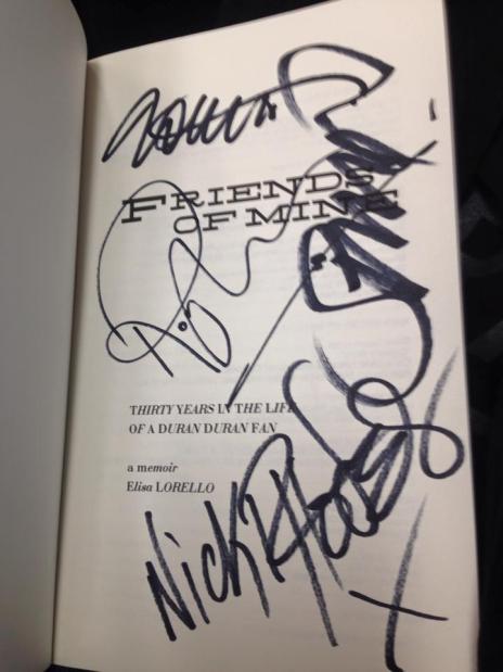 FoM title page signed by the band!