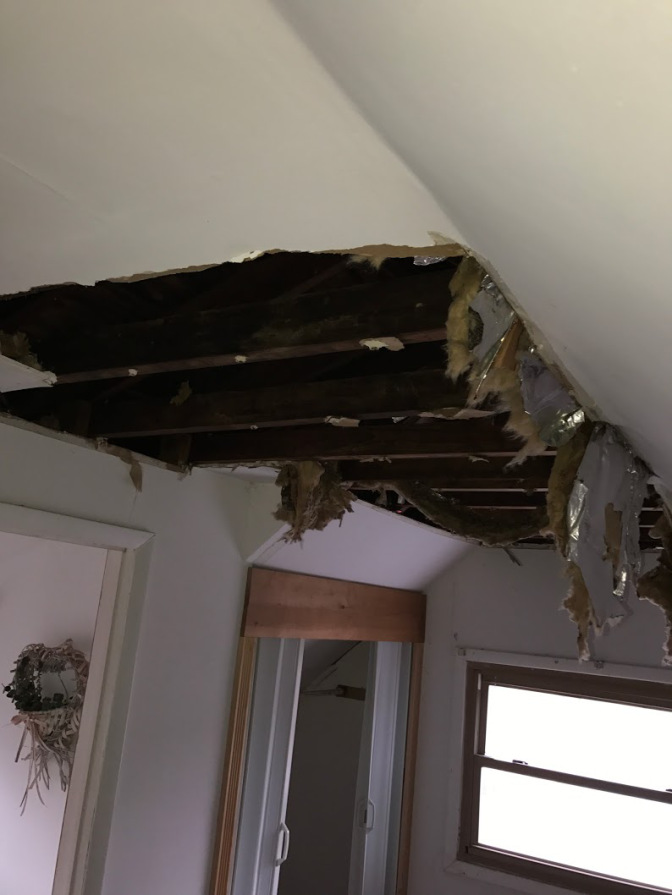 Collapsed ceiling - roof destroyed