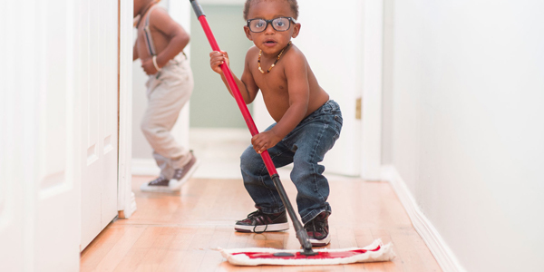 No Trolls, I'm not implying African American men are lazier than Whites. I like the photo and it highlights the need to get boys attuned to housework.