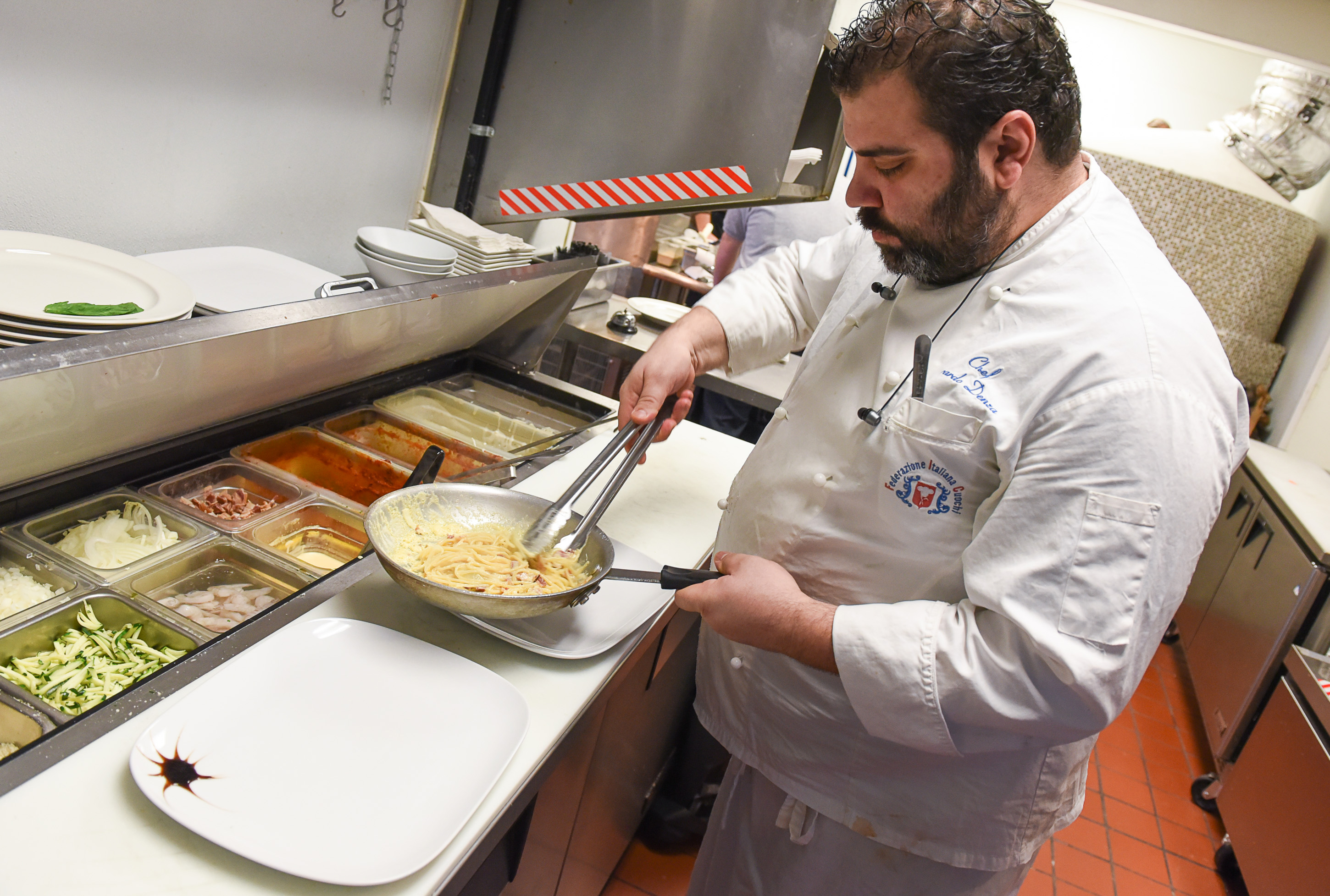 (Francisco Kjolseth  |  The Salt Lake Tribune)  Chef Gerardo Denzo prepares an order of spaghetti alla carbonara with bacon, onion, cream and egg at Terra Mia Italian restaurant in Draper, a sister restaurant to Terra Mia in Orem.