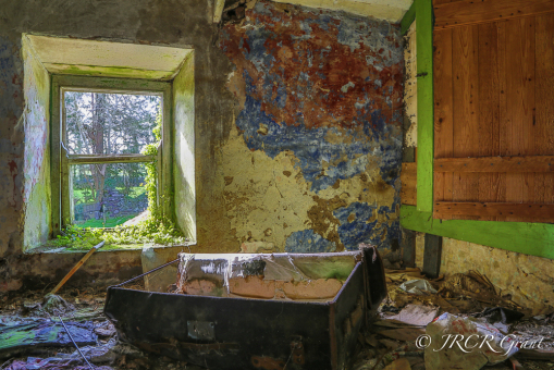 An old bedroom is haunted by the skeleton of an old trunk