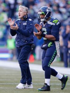 Pete Carroll and Russell Wilson plan to be clapping about their offense a lot this season (Getty Images)