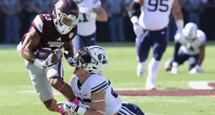 BYU football has set a record for futility. Will it relate to the next wave of departures from the Mormon church? (AP Photo/Jim Lytle)